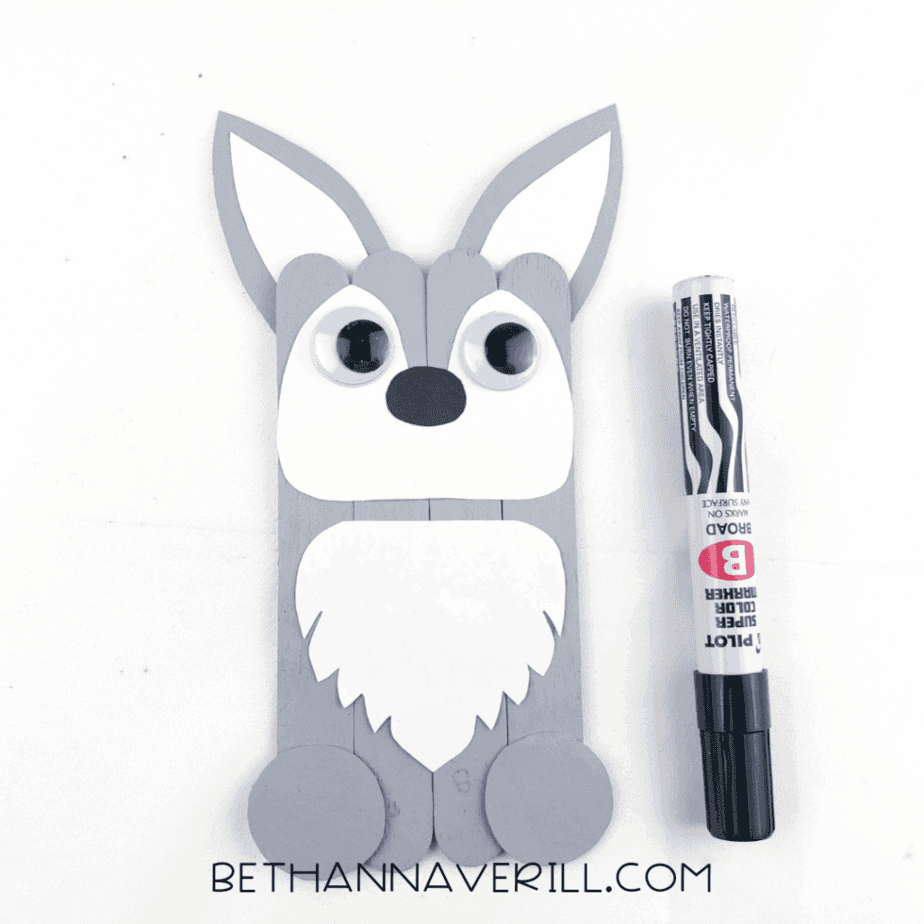 Black marker next to the wolf craft
