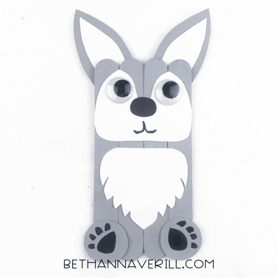 Wolf with a drawn smile and paw pads