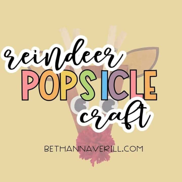 Graphic image with a faded reindeer craft in the background and bold text reading “reindeer popsicle craft” in colorful letters, with bethannaverill.com written below.