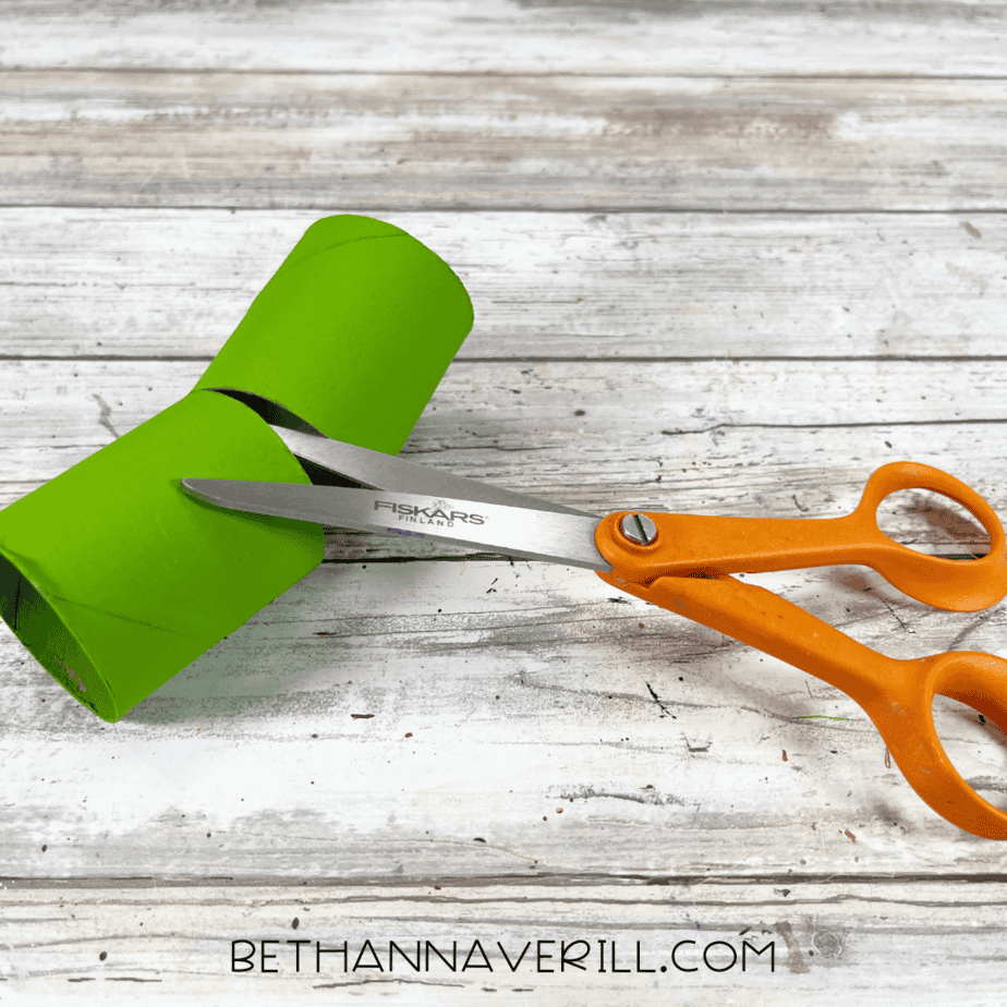 Green cardboard tubes cut into two short legs.