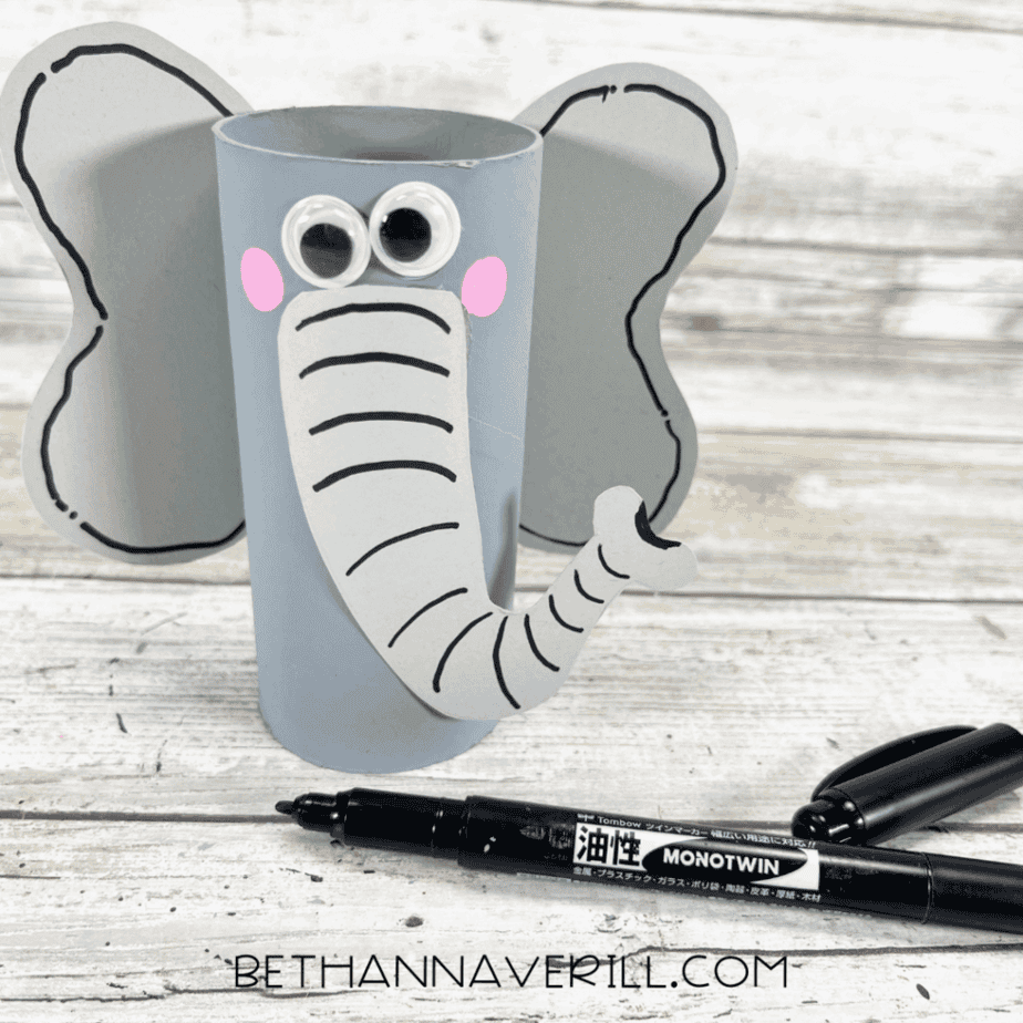 Elephant craft with black marker details on trunk and ears.