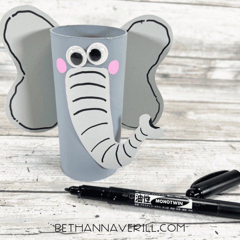 Elephant craft with black marker details on trunk and ears.