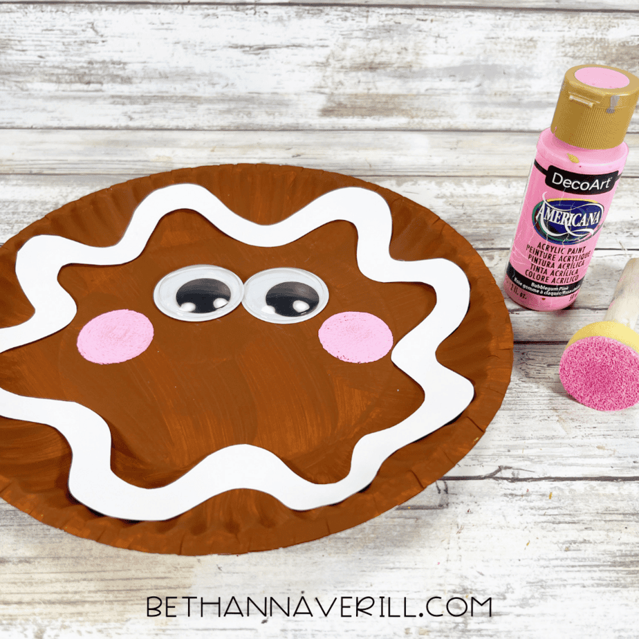 Pink cheeks added with a sponge dabber and paint.