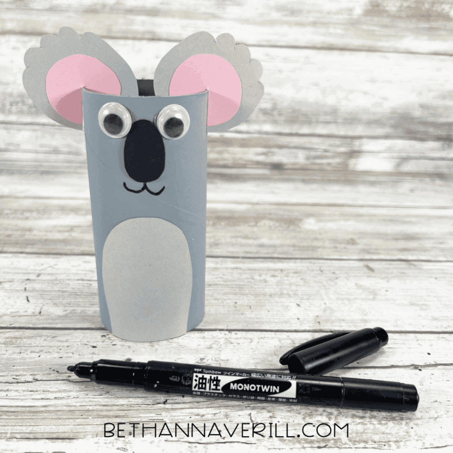 Koala craft with marker-drawn mouth under the nose.