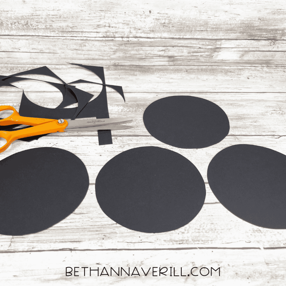 Black paper circles cut out for Mickey Mouse ears.