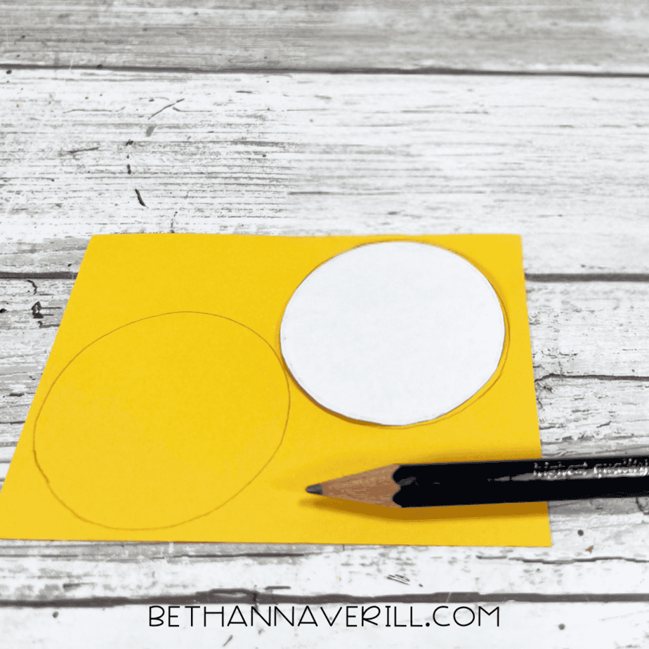 Yellow circles traced on paper for Mickey Mouse buttons.