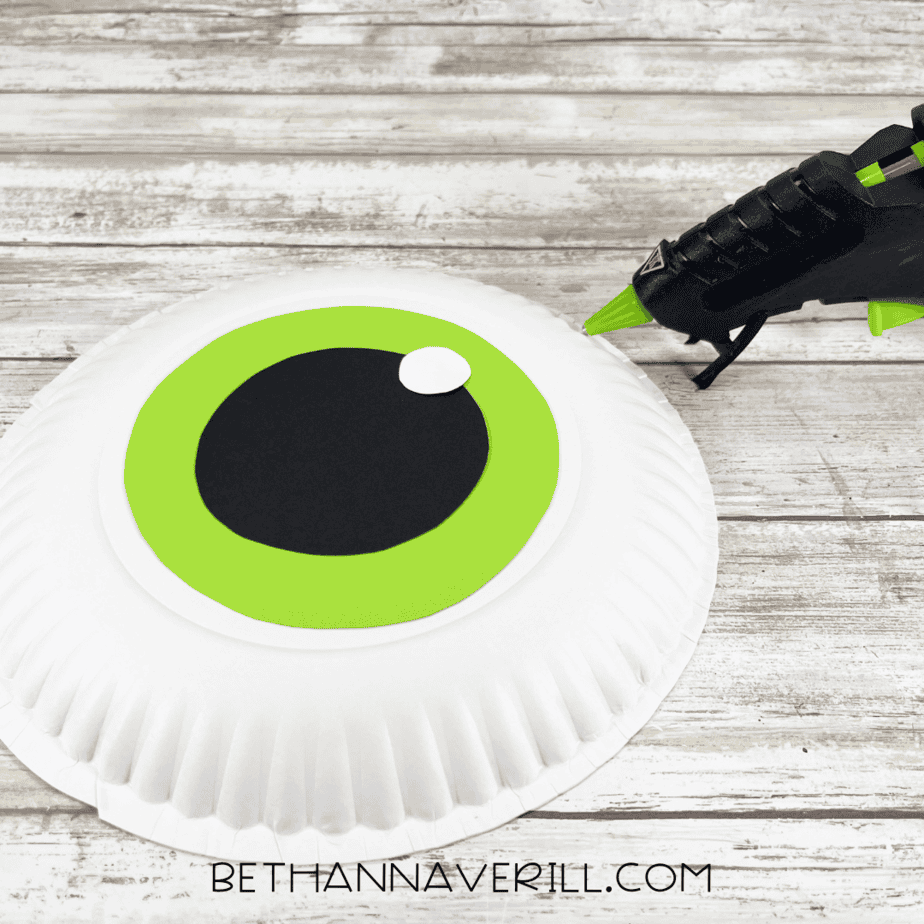 Small white circle glued to the black pupil to create a highlight for the monster eye.