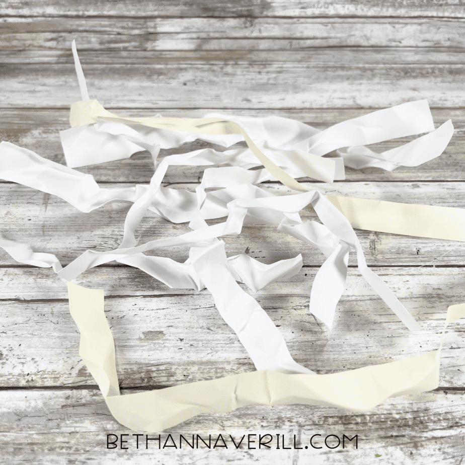Paper strips crumpled to look like mummy bandages.