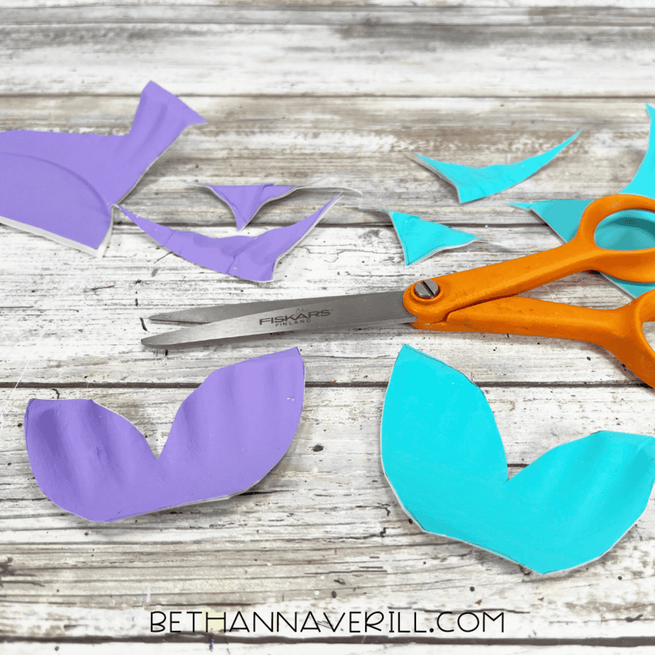 fins cut from painted paper plates.