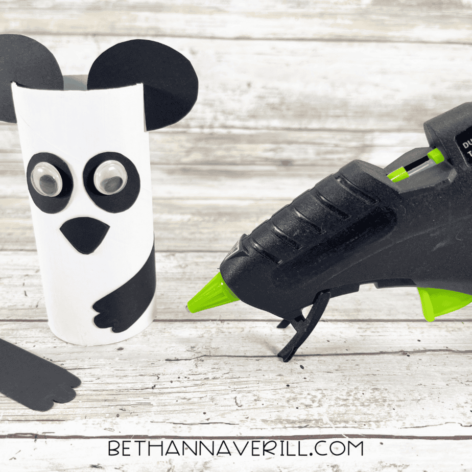 Panda paper roll with arms glued to the sides.
