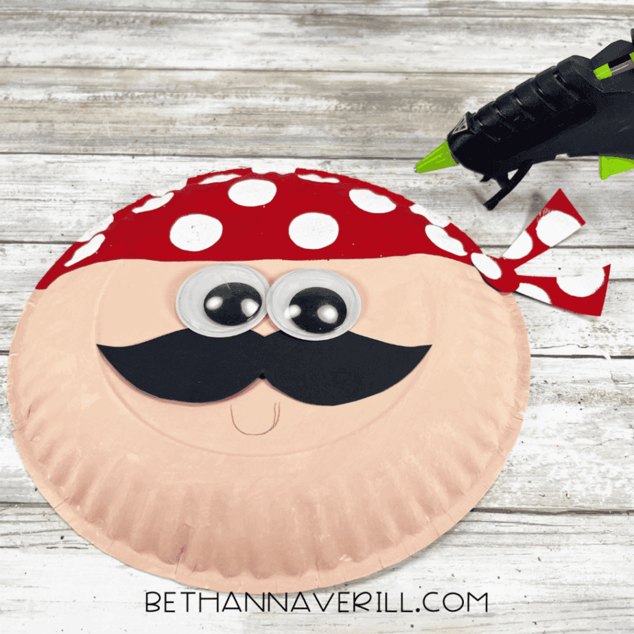 Pirate face with googly eyes, mustache, and red polka-dot bandana attached.