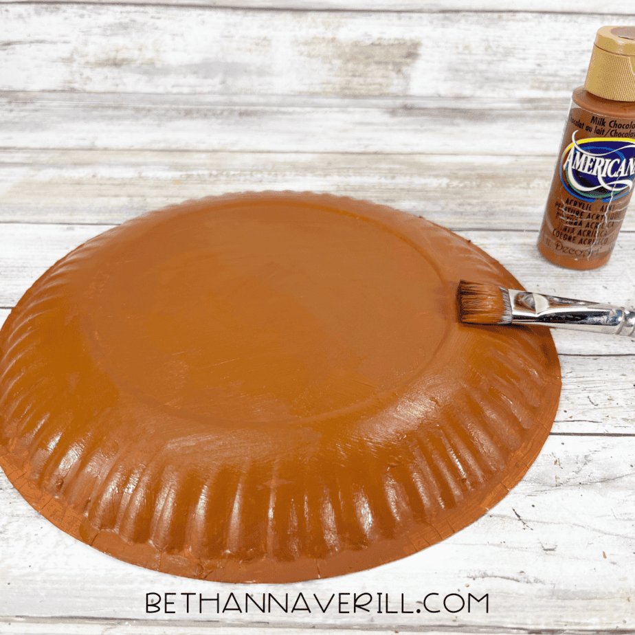 Paper plate painted brown for the base of the pirate ship.