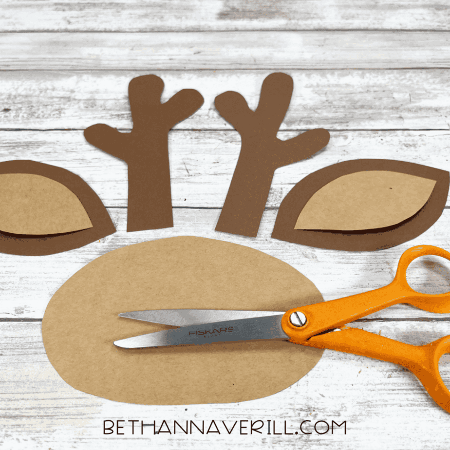 Cut-out antlers, ears, and muzzle pieces ready to assemble.