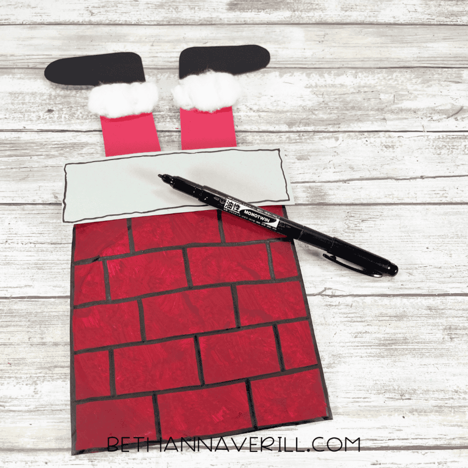 Santa chimney plate with added black marker details.
