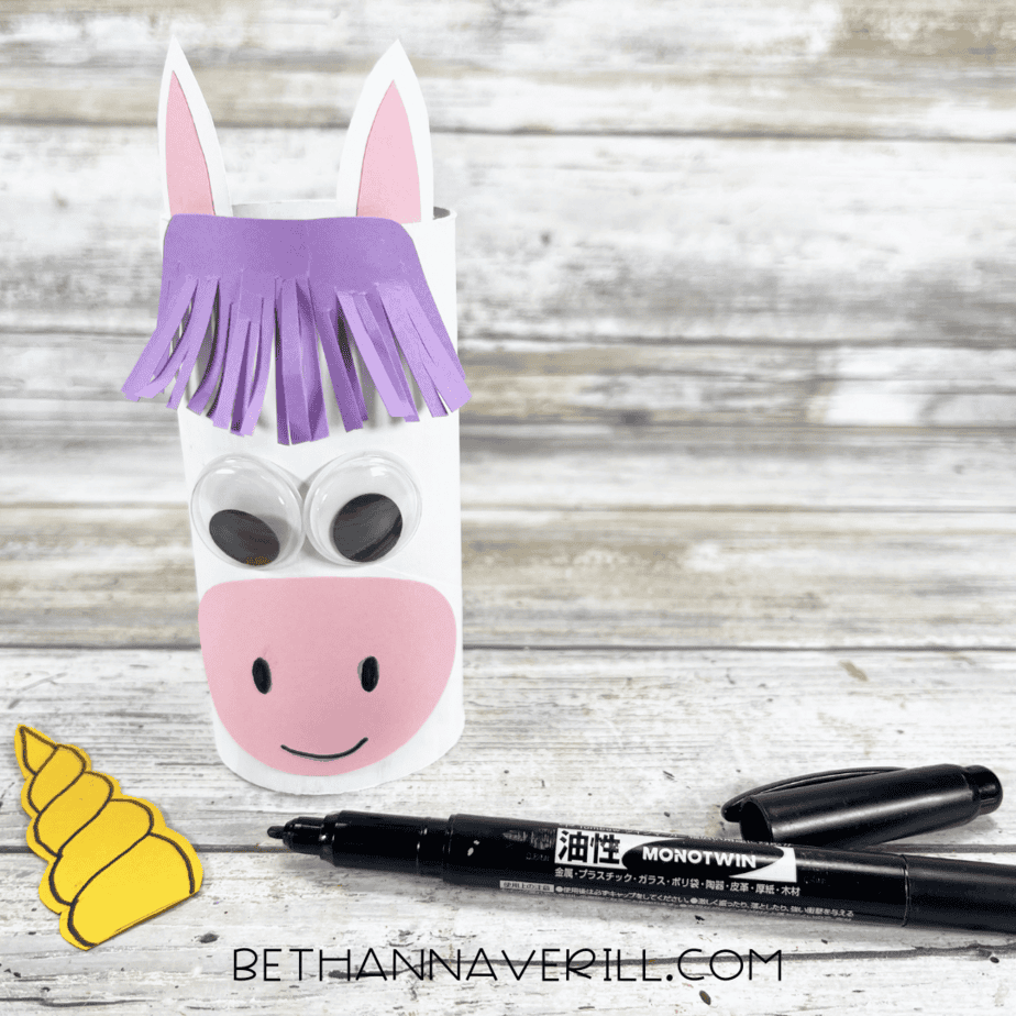 googly eyes glued on with black marker to draw on the unicorn's face
