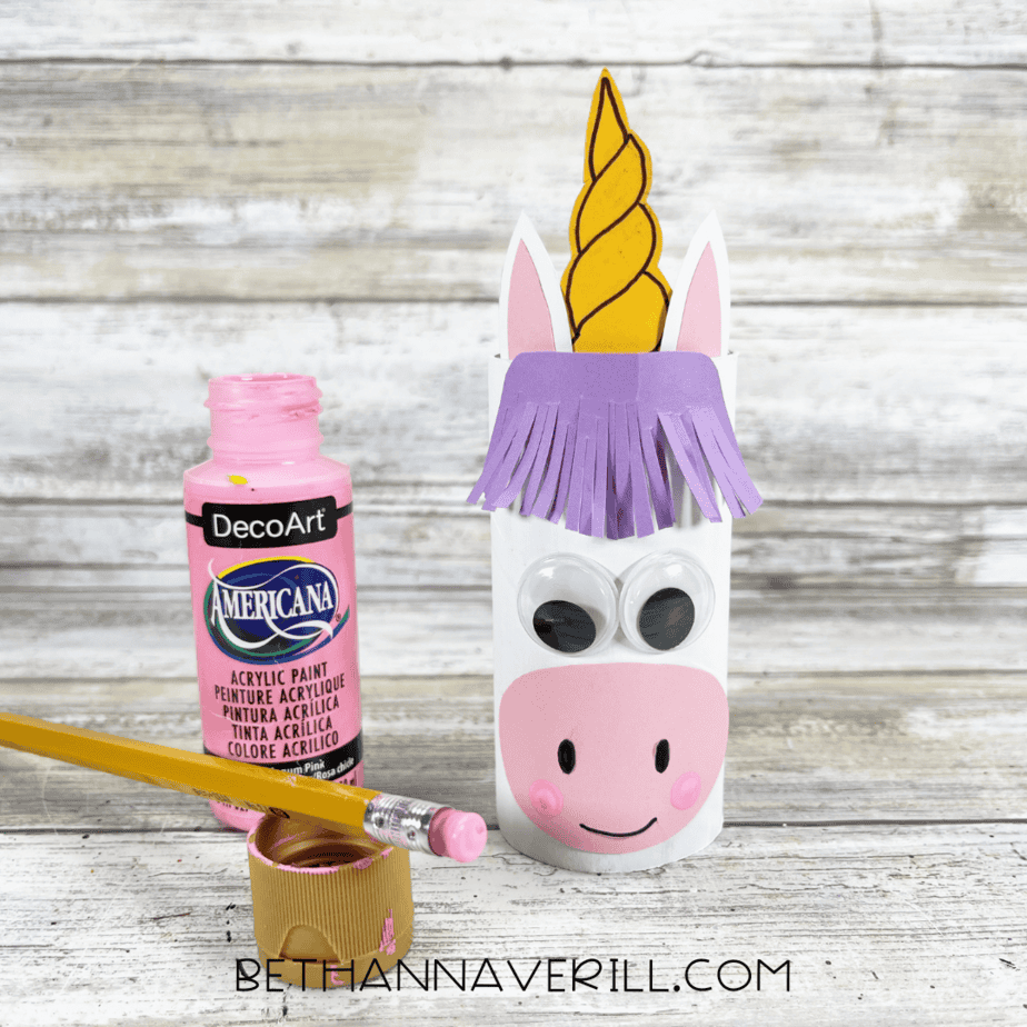 pink cheeks painted on to the unicorn