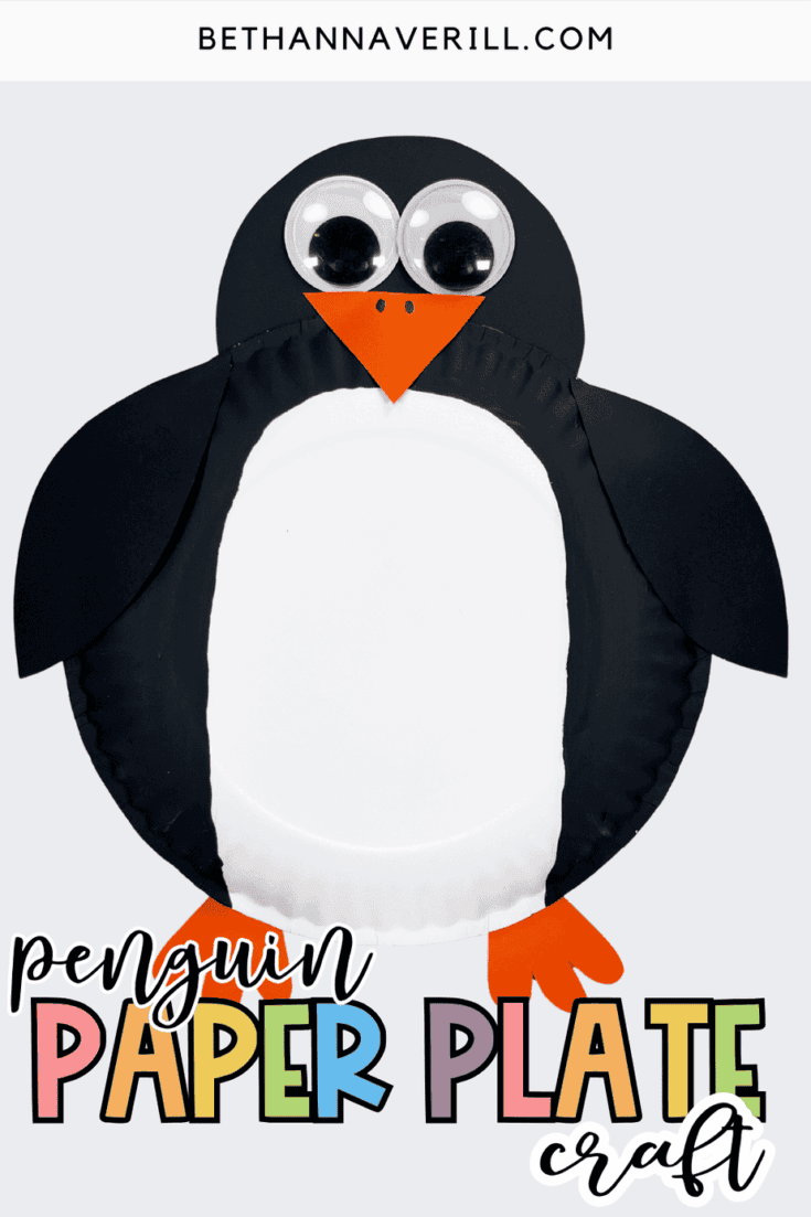 Finished paper plate penguin craft with big googly eyes, orange beak, and orange feet on a light gray background.
