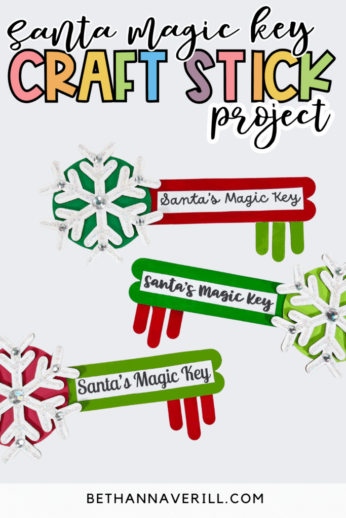Santa Magic Key craft stick project showing finished red and green popsicle stick keys decorated with snowflake ornaments.