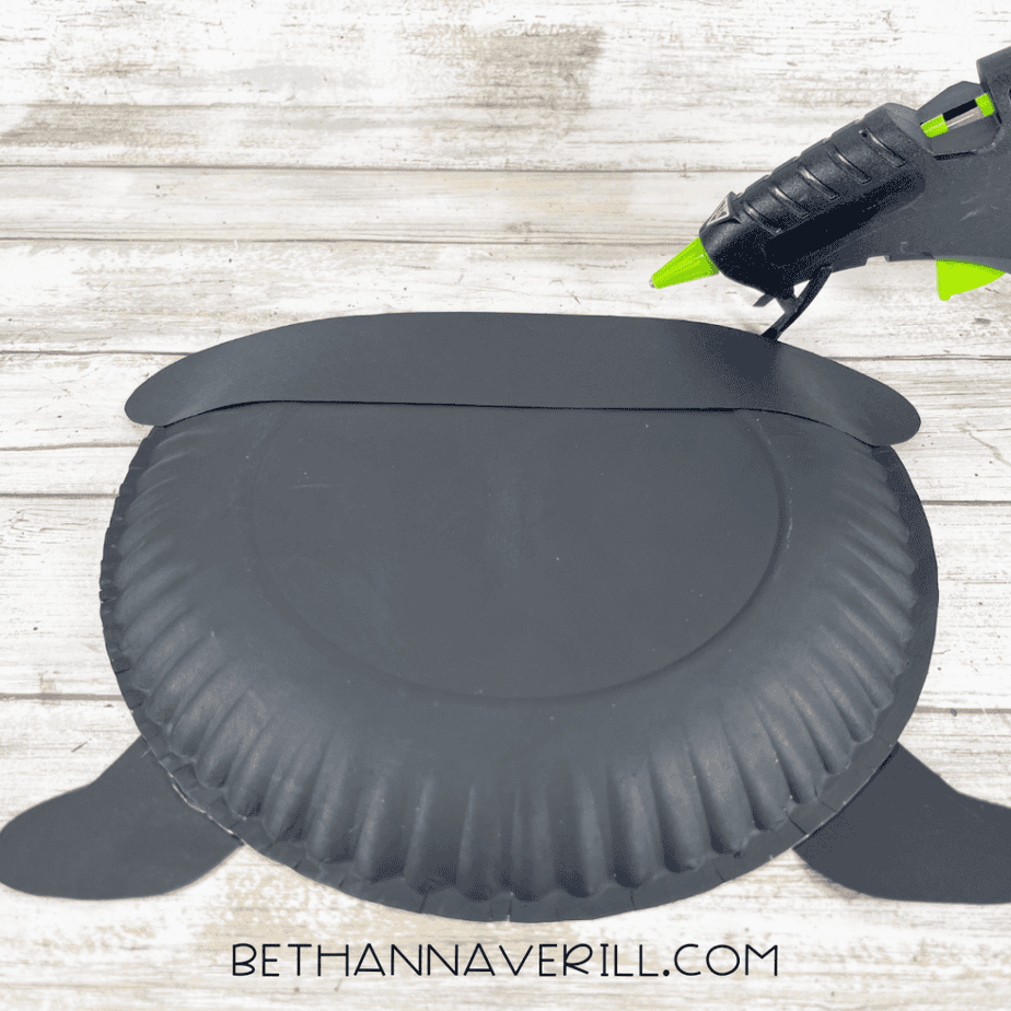 Image of the pot base assembled with the black paper strip glued across the top edge.