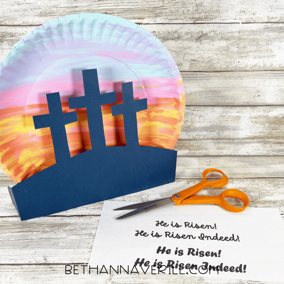 Printed text strips reading “He is Risen! He is Risen Indeed!” placed near the craft.