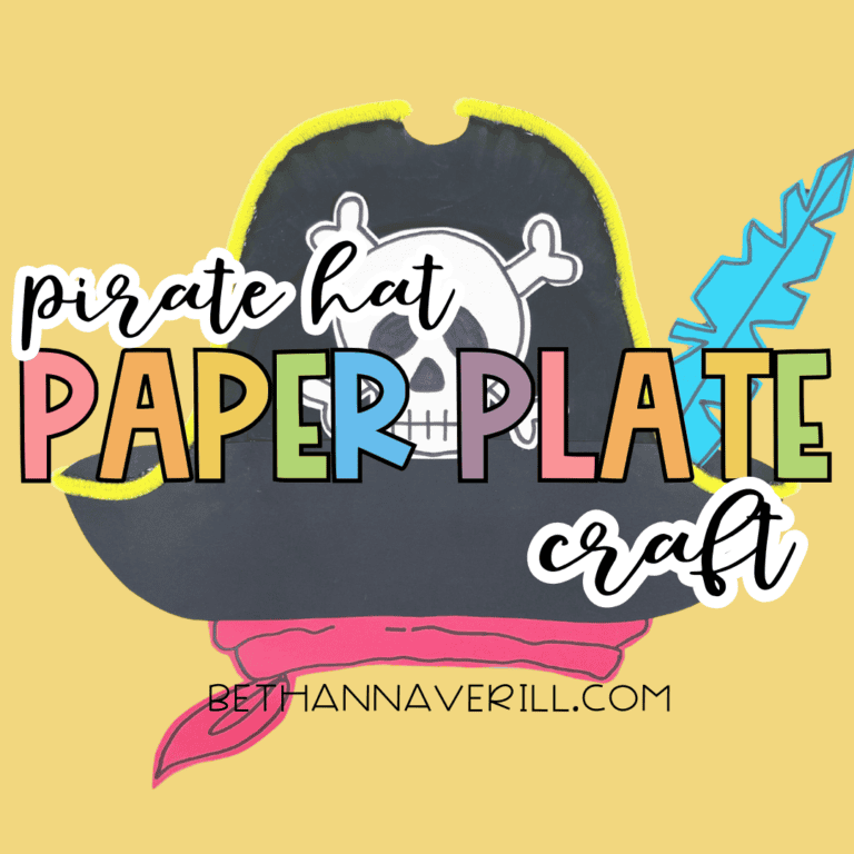 Pirate hat paper plate craft for kids with skull and feather decoration.
