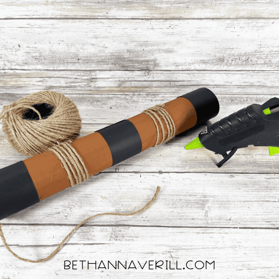 Twine wrapped around sections of the telescope tube for a pirate-style detail.