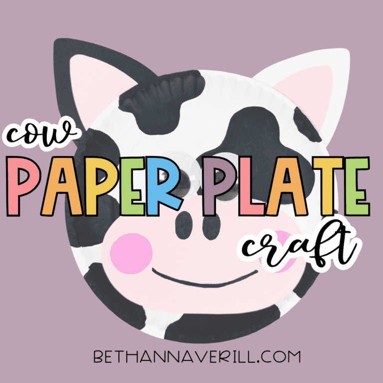 Finished paper plate cow craft on a muted purple background with the text “cow paper plate craft” across the image.