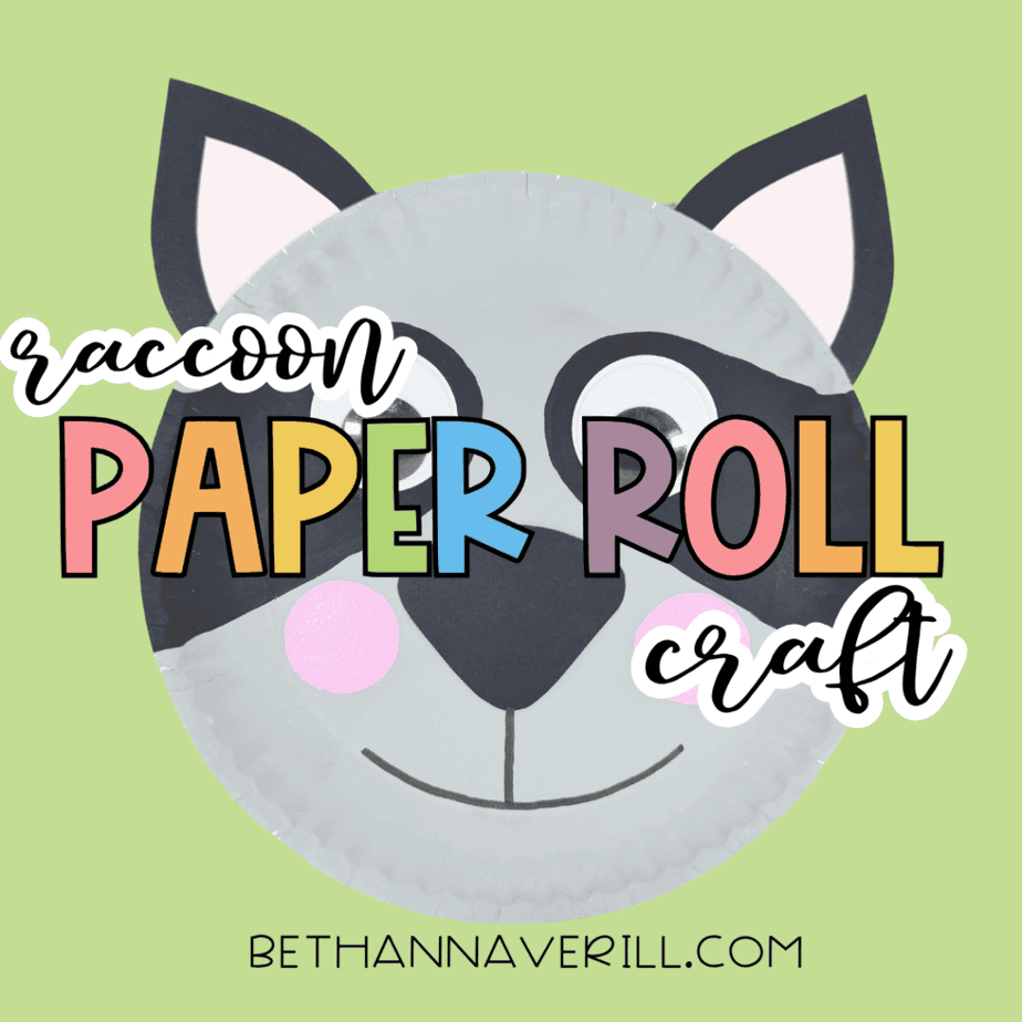 Finished paper plate raccoon craft on a light green background with the text “raccoon paper roll craft” across the image.